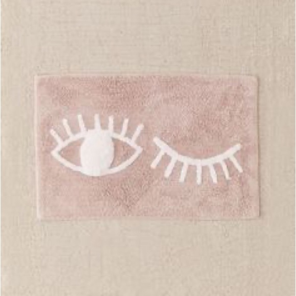 URBAN OUTFITTERS Soft Pink/White Winky Eye Bath Mat